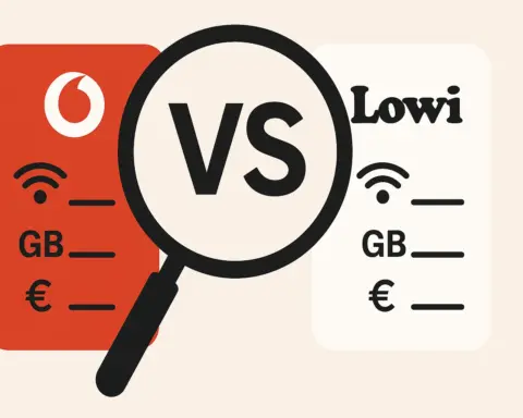 Comparativa entre tarifas de Vodafone y Lowi resaltada con una lupa sobre fondo claro.